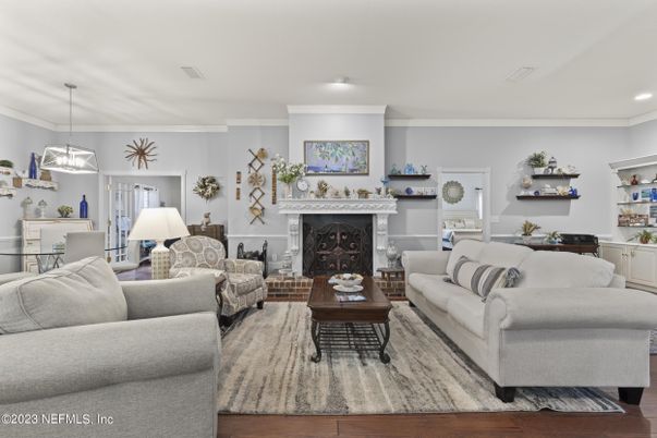 Dining room, Fireplace, Interior, Living room, Pendant Lights, Recessed Lighting, Wood Texture Flooring