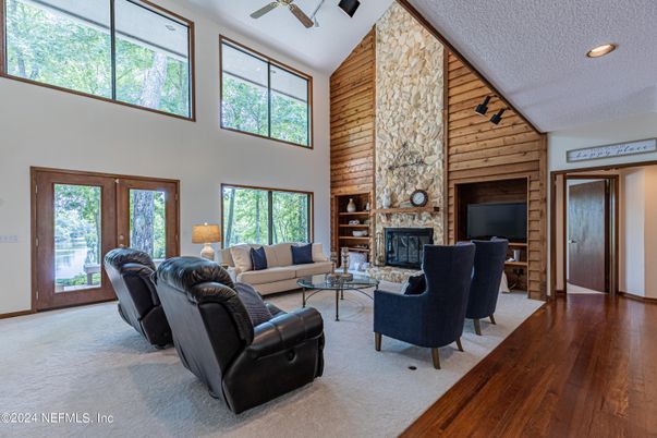 Fireplace, Interior, Living room, Recessed Lighting, Stone Walls, Wood Texture Flooring, Wooden Walls