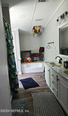 Bathroom, Dual Sink Vanities, Interior, Recessed Lighting, Wood Texture Flooring