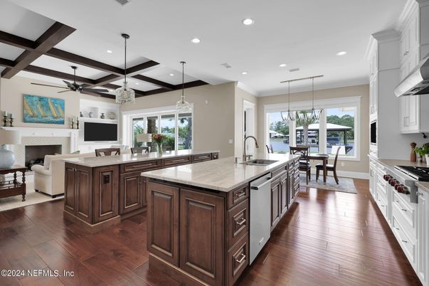 Dining room, Fireplace, Interior, Kitchen, Living room, Pendant Lights, Recessed Lighting, Stainless Steel Appliances, Wooden Beams, Wood Texture Flooring