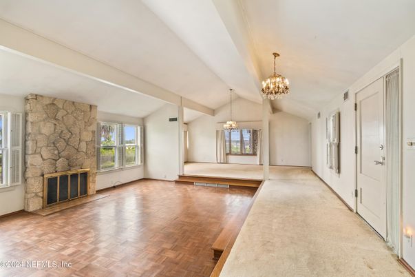 Chandelier, Empty room, Fireplace, Interior, Stone Walls, Wood Texture Flooring