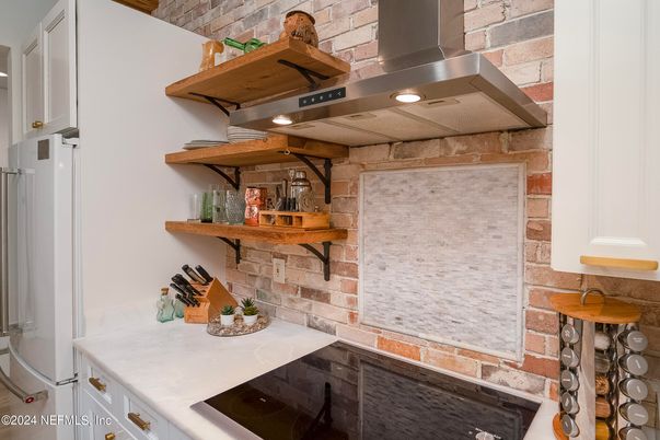 Interior, Kitchen, Recessed Lighting, Stainless Steel Appliances, Stone Walls