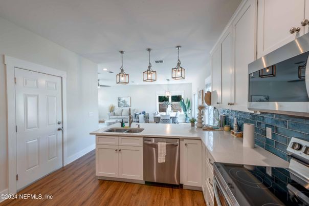 Dining room, Interior, Kitchen, Pendant Lights, Stainless Steel Appliances, Wood Texture Flooring