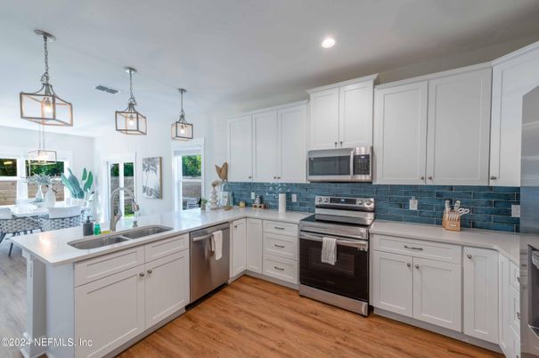 Interior, Kitchen, Pendant Lights, Recessed Lighting, Stainless Steel Appliances, Wood Texture Flooring