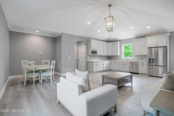 Dining room, Interior, Kitchen, Living room, Pendant Lights, Recessed Lighting, Stainless Steel Appliances, Wood Texture Flooring