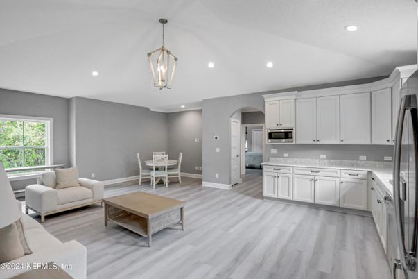 Dining room, Interior, Kitchen, Pendant Lights, Recessed Lighting, Stainless Steel Appliances, Wood Texture Flooring