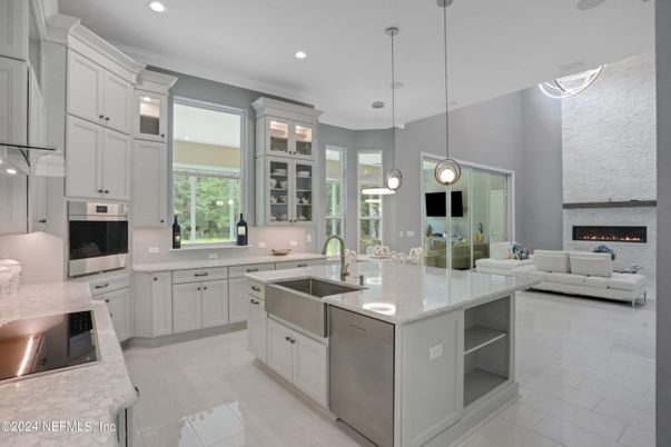 Fireplace, Interior, Kitchen, Living room, Pendant Lights, Recessed Lighting, Stainless Steel Appliances