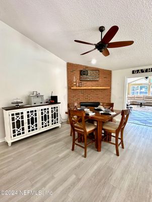 Dining room, Fireplace, Interior, Stone Walls, Wood Texture Flooring