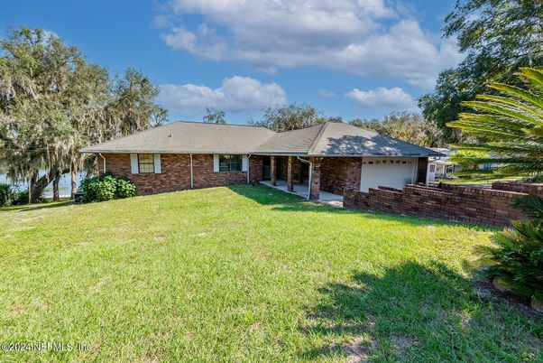 Attached, Backyard, Exterior, Facade, Brick Facade, Ranch
