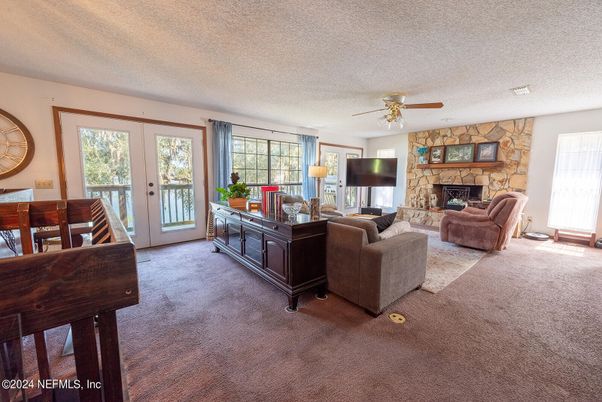 Dining room, Fireplace, Interior, Living room, Stone Walls