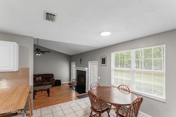 Dining room, Fireplace, Interior, Recessed Lighting, Wood Texture Flooring