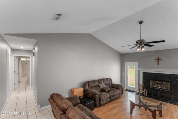 Fireplace, Interior, Living room, Recessed Lighting, Wood Texture Flooring