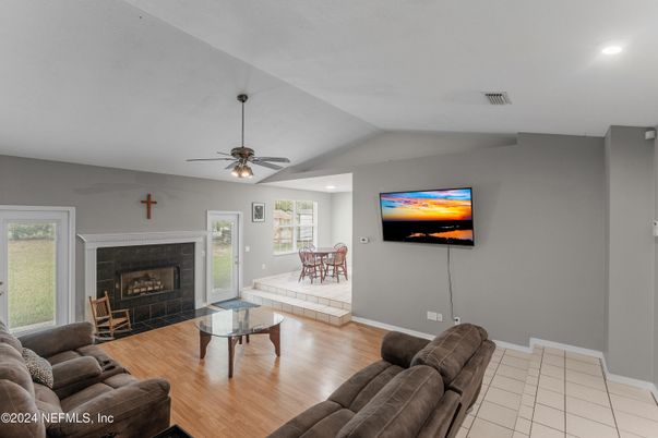 Fireplace, Interior, Living room, Recessed Lighting, Wood Texture Flooring