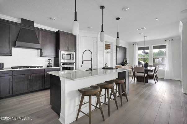 Dining room, Interior, Kitchen, Pendant Lights, Recessed Lighting, Stainless Steel Appliances, Wood Texture Flooring