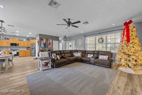 Dining room, Interior, Kitchen, Living room, Pendant Lights, Recessed Lighting, Stainless Steel Appliances, Wood Texture Flooring