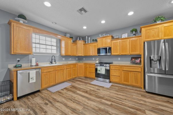 Interior, Kitchen, Recessed Lighting, Stainless Steel Appliances, Wood Texture Flooring