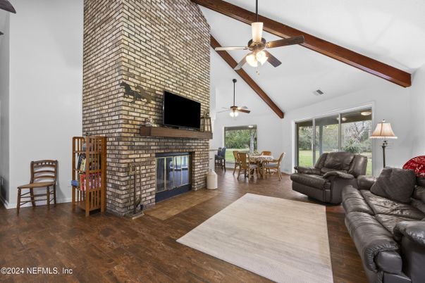 Dining room, Fireplace, Interior, Living room, Stone Walls, Wooden Beams, Wood Texture Flooring