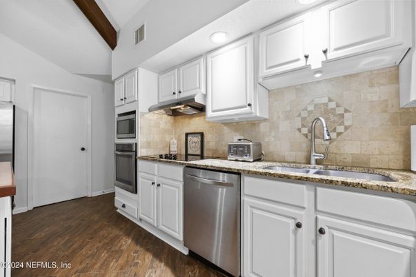 Interior, Kitchen, Recessed Lighting, Stainless Steel Appliances, Stone Walls, Wood Texture Flooring