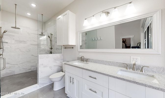 Bathroom, Dual Sink Vanities, Glass Shower, Interior, Marble Walls, Recessed Lighting