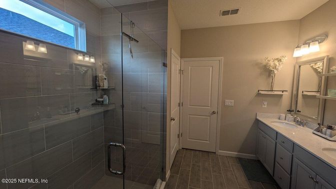 Bathroom, Dual Sink Vanities, Glass Shower, Interior, Wood Texture Flooring
