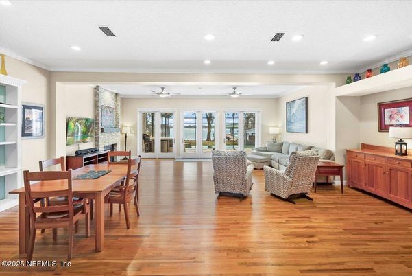 Dining room, Fireplace, Interior, Living room, Piano, Recessed Lighting, Wood Texture Flooring