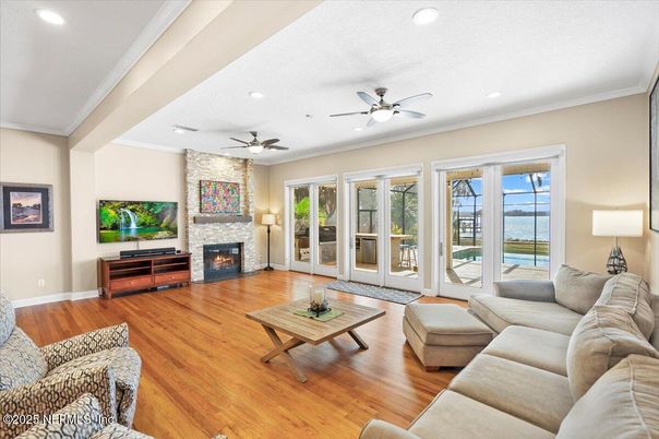 Fireplace, Interior, Living room, Recessed Lighting, Stone Walls, Wood Texture Flooring
