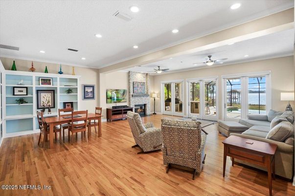 Dining room, Fireplace, Interior, Living room, Recessed Lighting, Wood Texture Flooring