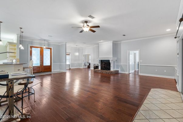 Empty room, Fireplace, Interior, Kitchen, Pendant Lights, Recessed Lighting, Wood Texture Flooring