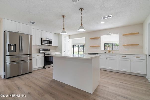 Interior, Kitchen, Pendant Lights, Recessed Lighting, Stainless Steel Appliances, Wood Texture Flooring