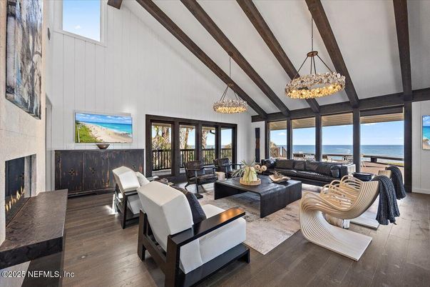 Chandelier, Fireplace, Interior, Living room, Pendant Lights, Water, Wooden Beams, Wood Texture Flooring