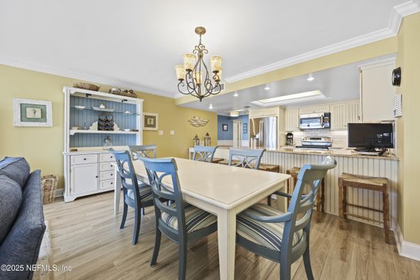 Chandelier, Dining room, Interior, Kitchen, Recessed Lighting, Stainless Steel Appliances, Wood Texture Flooring