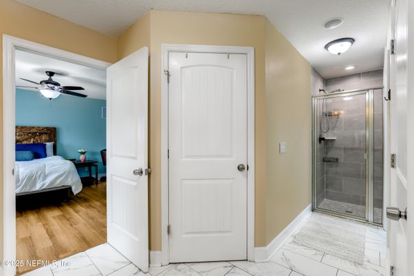 Bathroom, Bedroom, Glass Shower, Interior, Marble, Recessed Lighting, Wood Texture Flooring