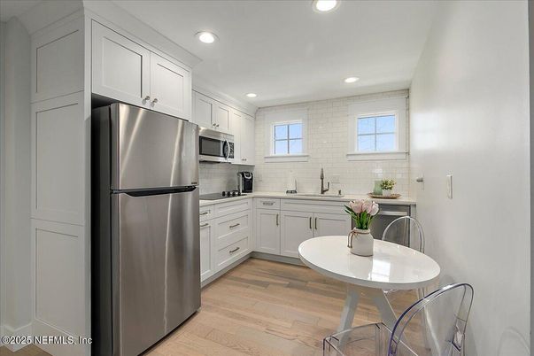 Interior, Kitchen, Recessed Lighting, Stainless Steel Appliances, Wood Texture Flooring