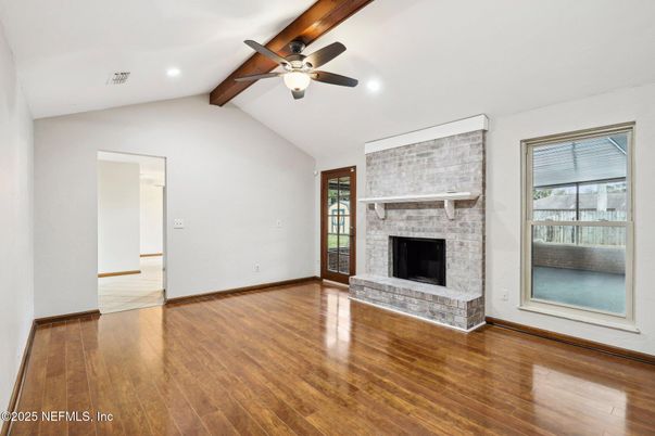 Empty room, Fireplace, Interior, Recessed Lighting, Stone Walls, Wooden Beams, Wood Texture Flooring