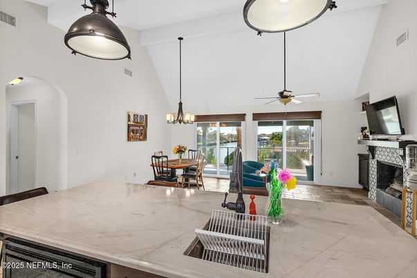 Chandelier, Dining room, Fireplace, Interior, Pendant Lights