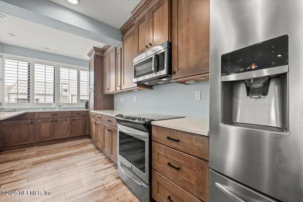 Interior, Kitchen, Recessed Lighting, Stainless Steel Appliances, Wood Texture Flooring