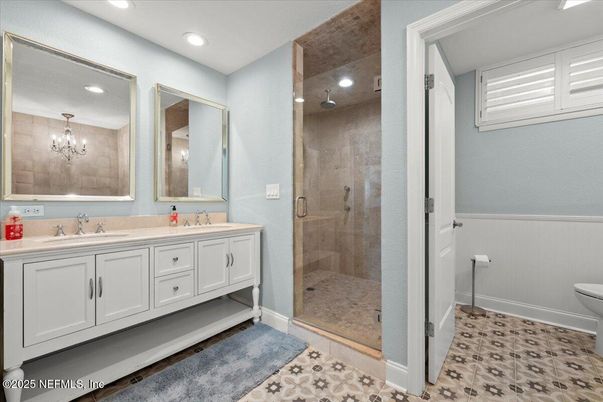 Bathroom, Chandelier, Dual Sink Vanities, Glass Shower, Interior, Recessed Lighting