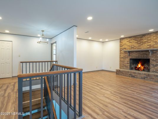 Fireplace, Interior, Recessed Lighting, Stone Walls, Wood Texture Flooring