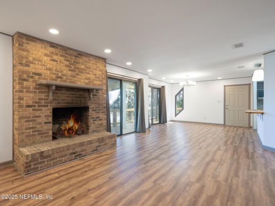Empty room, Fireplace, Interior, Recessed Lighting, Stone Walls, Wood Texture Flooring
