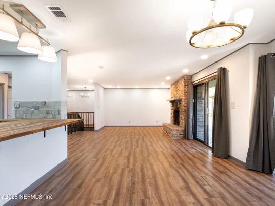 Empty room, Fireplace, Interior, Pendant Lights, Recessed Lighting, Wood Texture Flooring