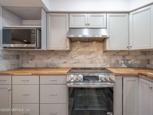 Interior, Kitchen, Marble Walls, Stainless Steel Appliances