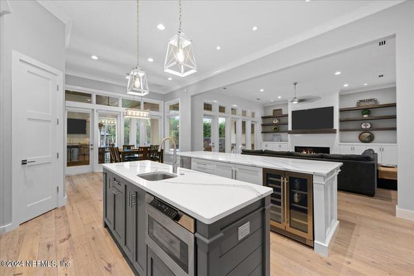 Dining room, Fireplace, Interior, Kitchen, Living room, Pendant Lights, Recessed Lighting, Wood Texture Flooring