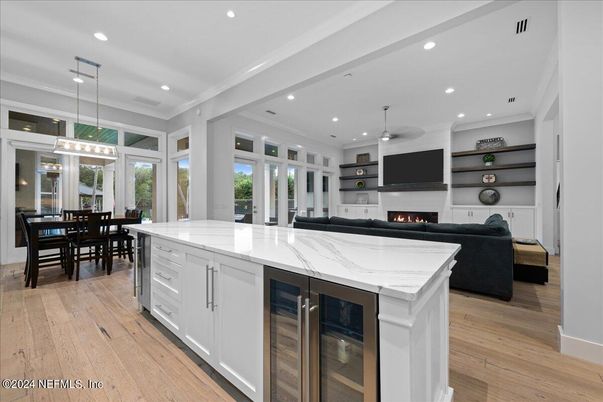 Dining room, Fireplace, Interior, Kitchen, Living room, Pendant Lights, Recessed Lighting, Wood Texture Flooring