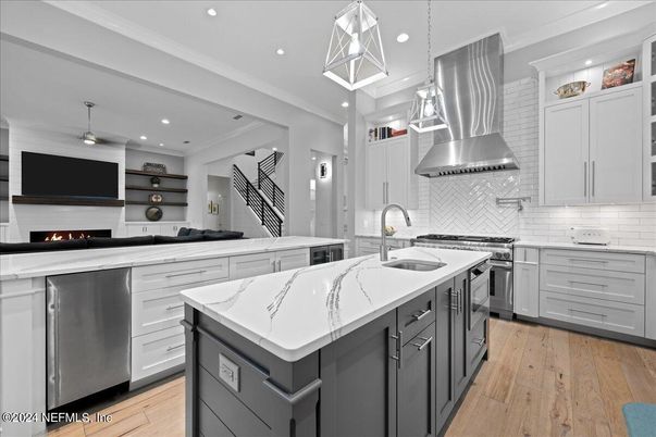 Fireplace, Interior, Kitchen, Pendant Lights, Recessed Lighting, Stainless Steel Appliances, Wood Texture Flooring