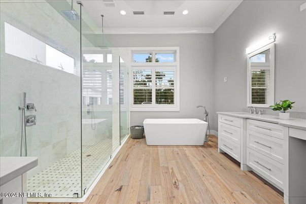 Bathroom, Free Standing Baths, Glass Shower, Interior, Recessed Lighting, Wood Texture Flooring