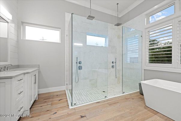 Bathroom, Free Standing Baths, Glass Shower, Interior, Marble Walls, Wood Texture Flooring