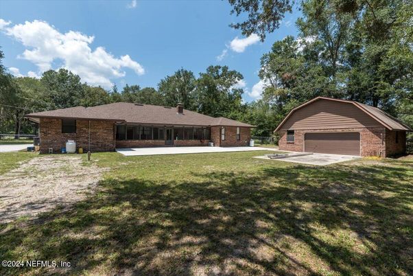 Attached, Backyard, Exterior, Facade, Brick Facade, Ranch