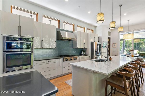 Interior, Kitchen, Pendant Lights, Recessed Lighting, Stainless Steel Appliances, Wood Texture Flooring