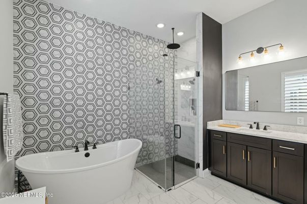 Bathroom, Dual Sink Vanities, Free Standing Baths, Glass Shower, Interior, Marble, Marble Walls, Recessed Lighting