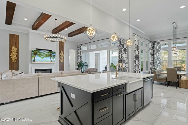 Dining room, Fireplace, Interior, Kitchen, Living room, Marble, Pendant Lights, Recessed Lighting, Stainless Steel Appliances, Wooden Beams